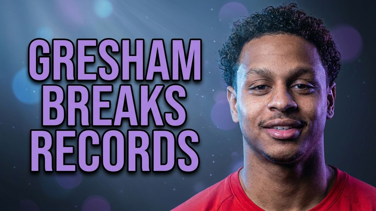 Graphic of Grenadian swimmer Zackary Gresham with the headline Gresham Breaks Records.